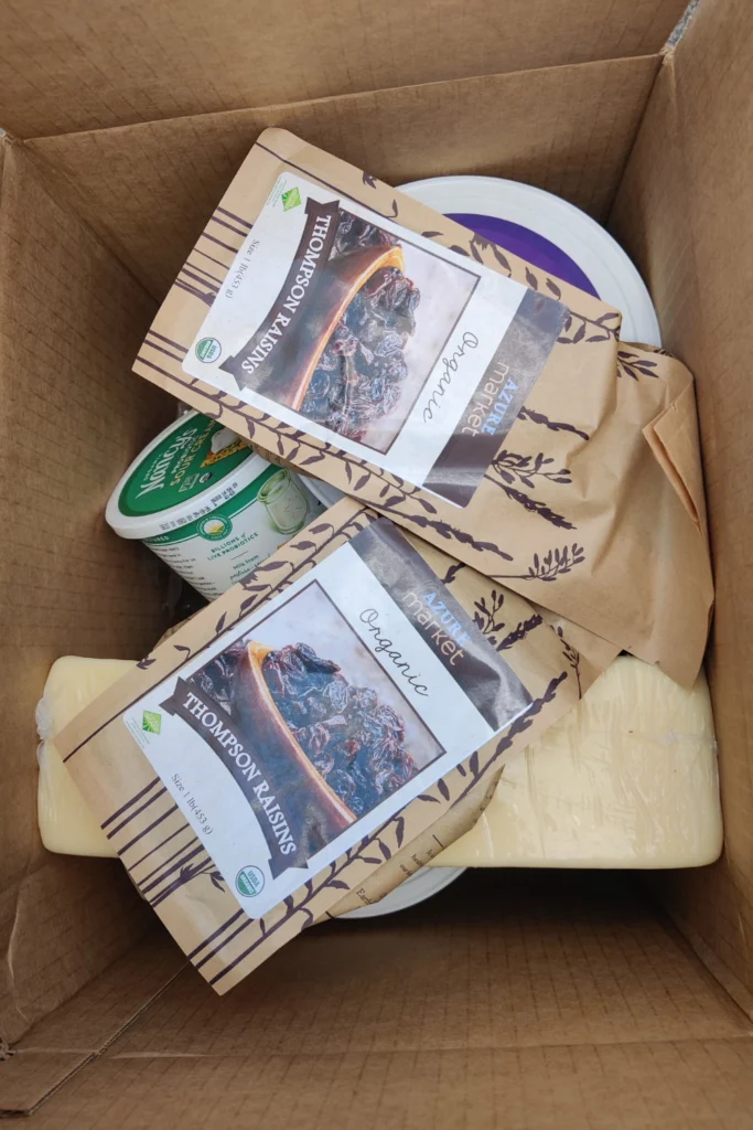 azure food items in a cardboard box
