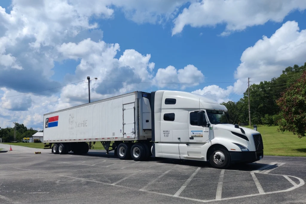 azure standard semi truck at a drop location