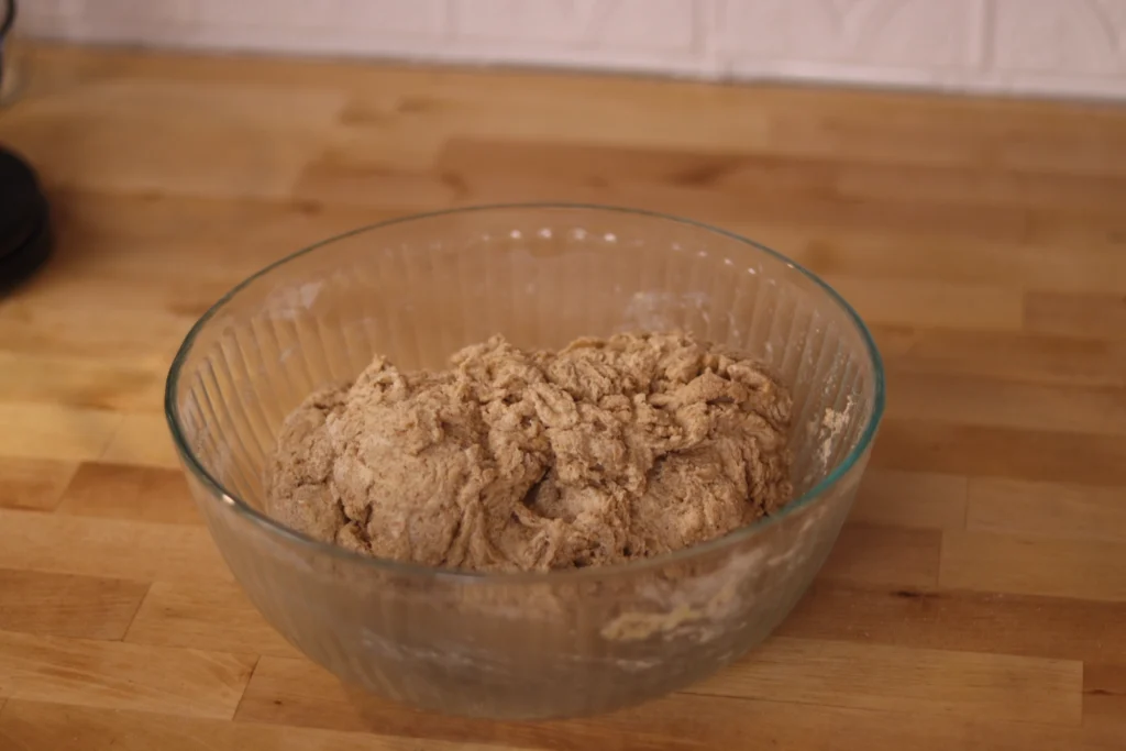 dough autolyzing in a glass bowl