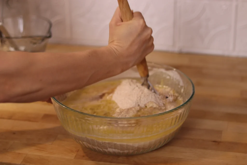 mixing dough with a dough whisk